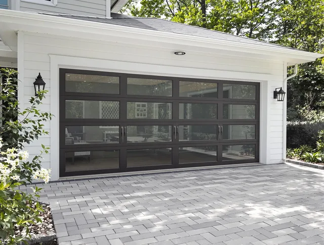 Valley Falls Garage Door Repair design specialist presenting custom garage door options to Valley Falls homeowner