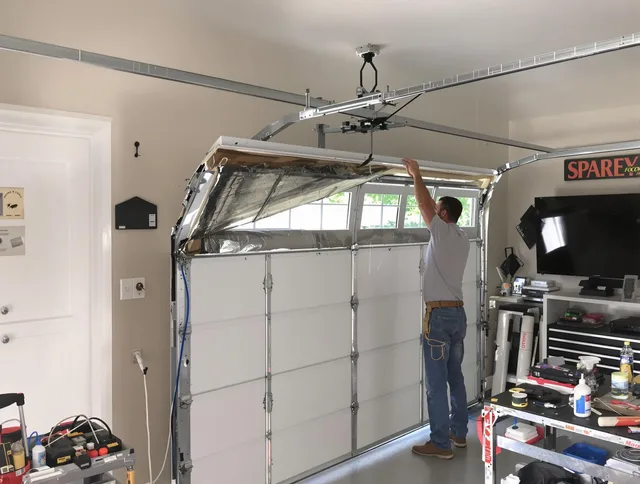 Garage door section replacement by Valley Falls Garage Door Repair in Valley Falls
