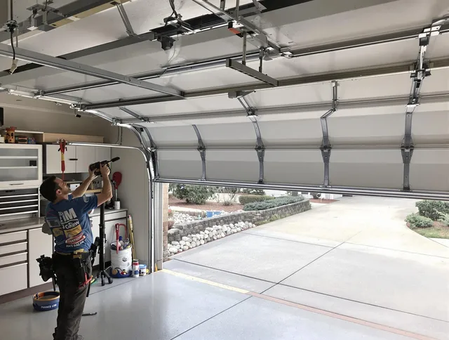 Garage door track repair service by Valley Falls Garage Door Repair in Valley Falls